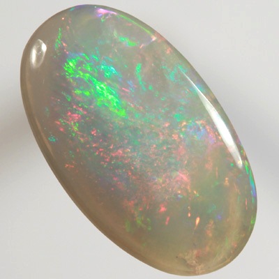 SOLID SEMI BLACK OPAL  Very bright fire, red and green. SEE VIDEO